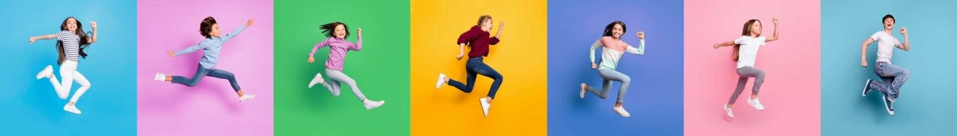 英国風のカラフルな背景に飛び跳ねる人々のグループ。