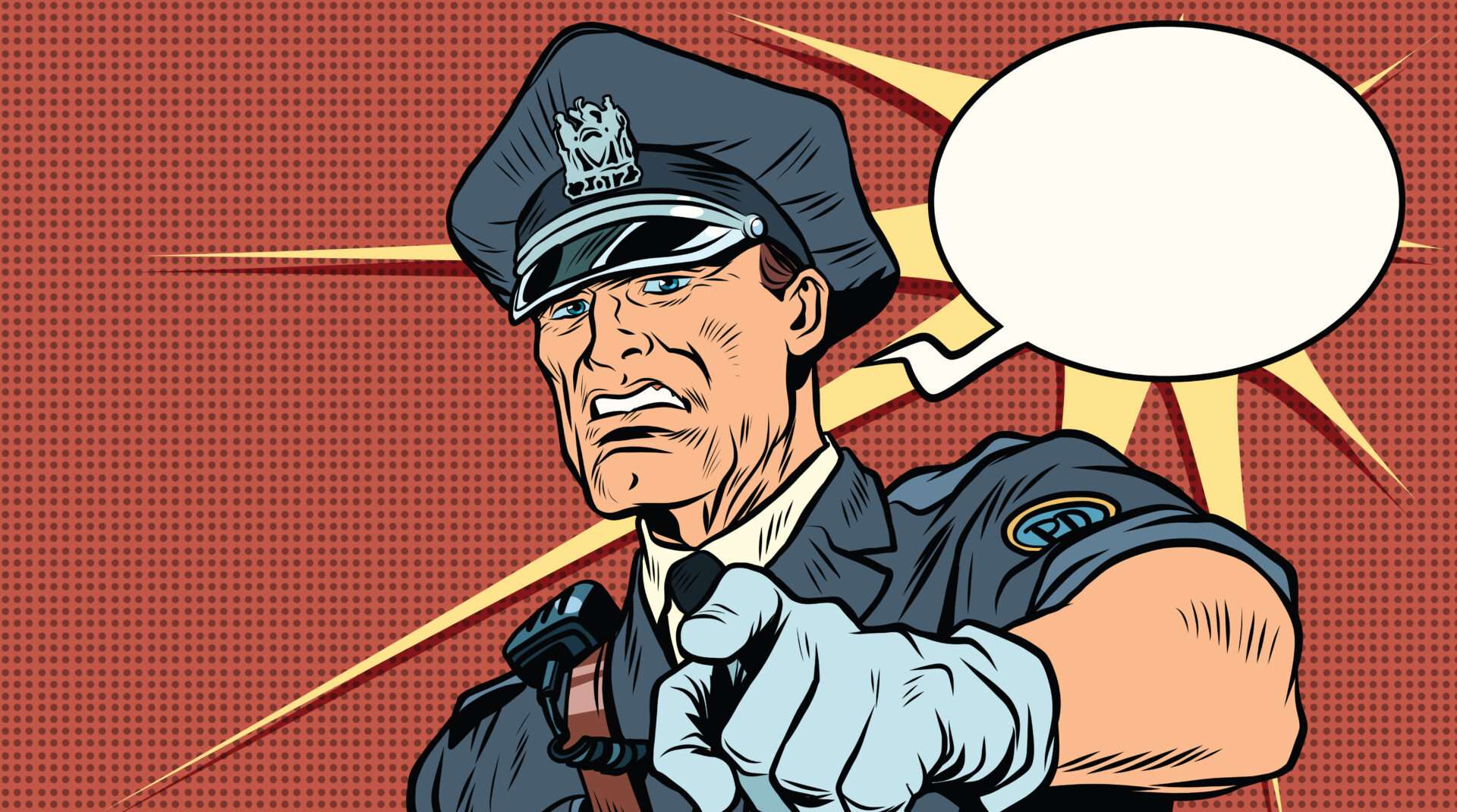 英語の吹き出しを指差す警察官。